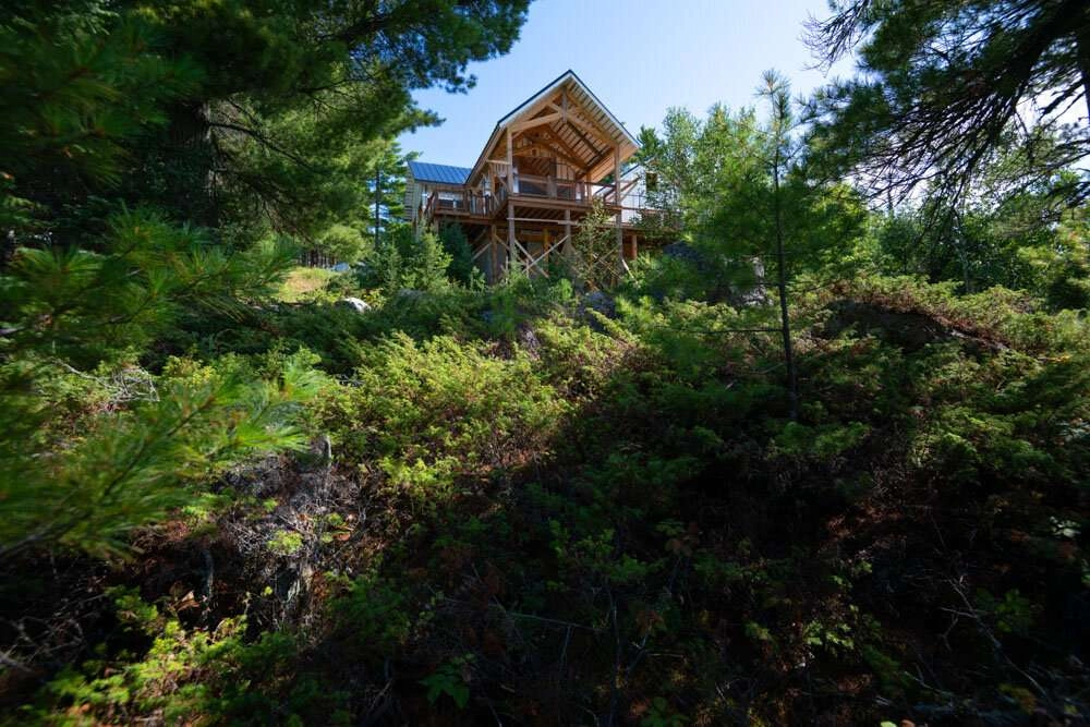 The building fits in nicely with the surrounding environment. © robert lowdon