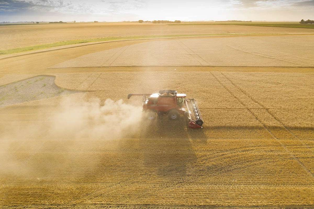 Blog - 1 Agriculture Photography 009 Tracking the combine through the dust cloud. © robert lowdon