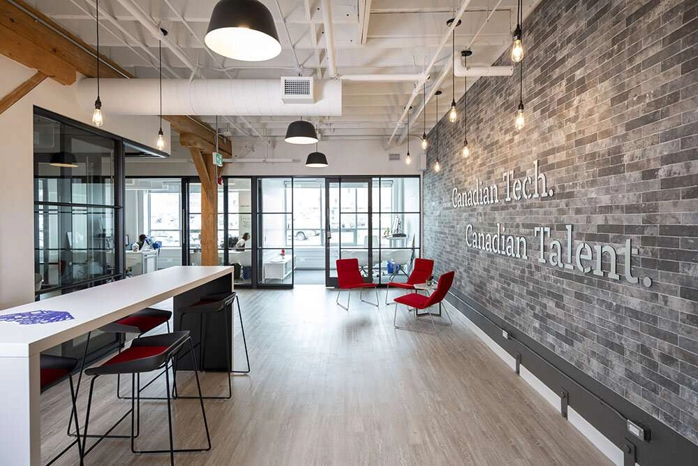 The front entrance of the office space, features two different types of lighting. ©Robert Lowdon