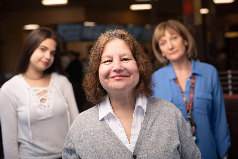 Mother in the forefront of the image. © robert lowdon