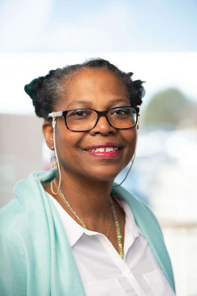 A closer headshot style image with the window in the background. © robert lowdon