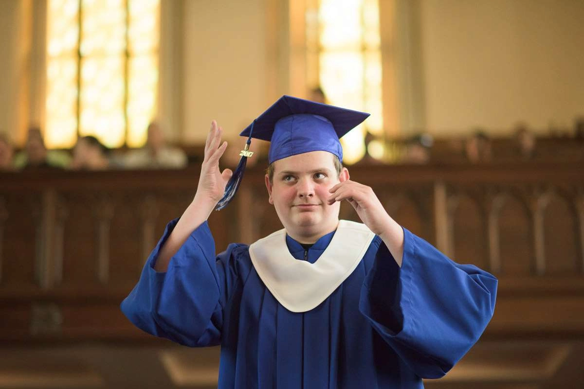 Editorial Photography For Cdi College - 3 Image Asset In this candid shot, a graduate moves the tassel on their graduation cap from one side to the other, signifying that they have received their diploma.