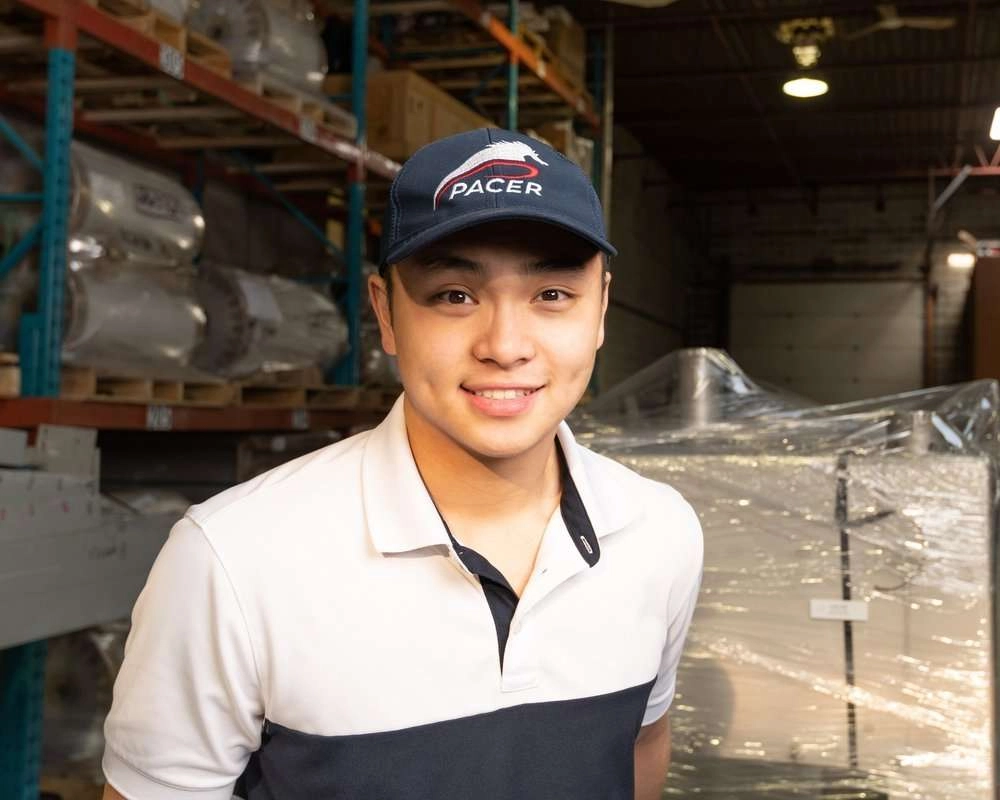 Warehouse worker moves pallet