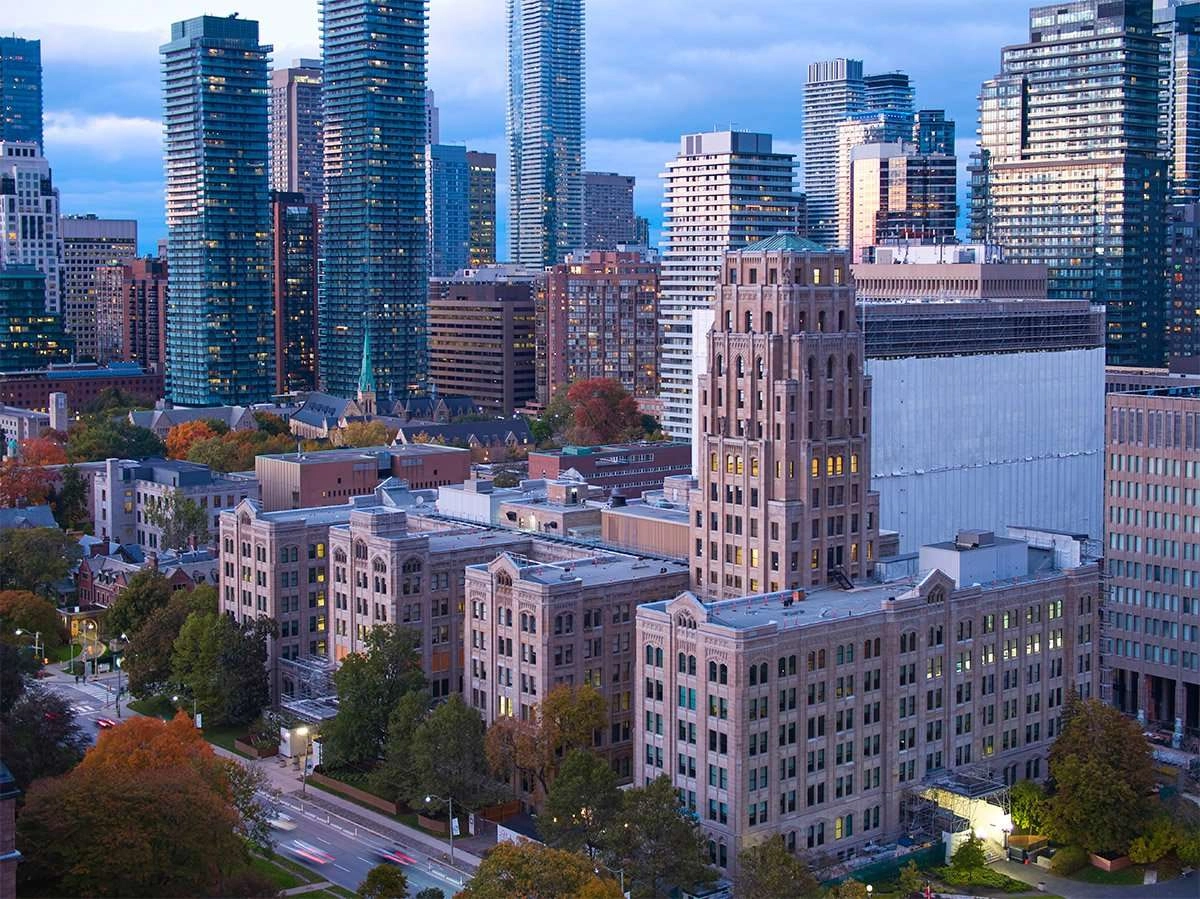 drone photography of art deco building in toronto at dusk