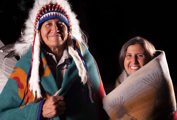 Couple poses outdoor for book 