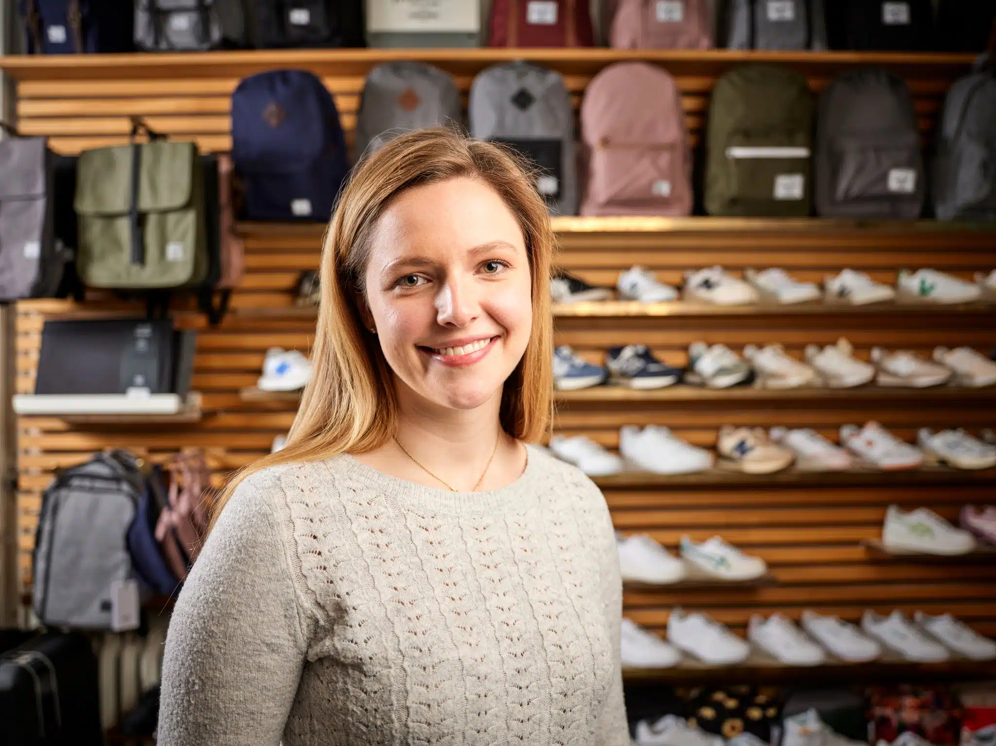 Retail store customer in shoe section.