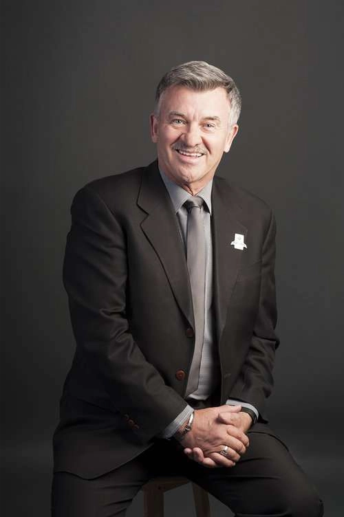 Corporate portrait on grey background