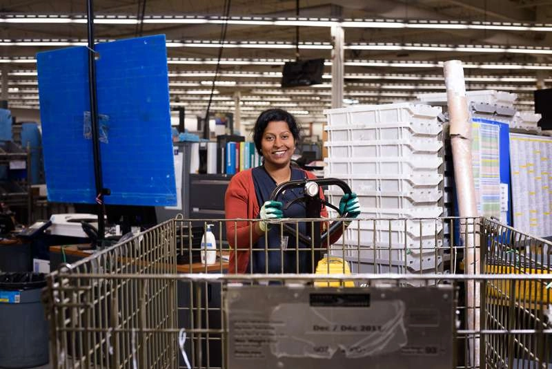 Warehouse worker moves stock around