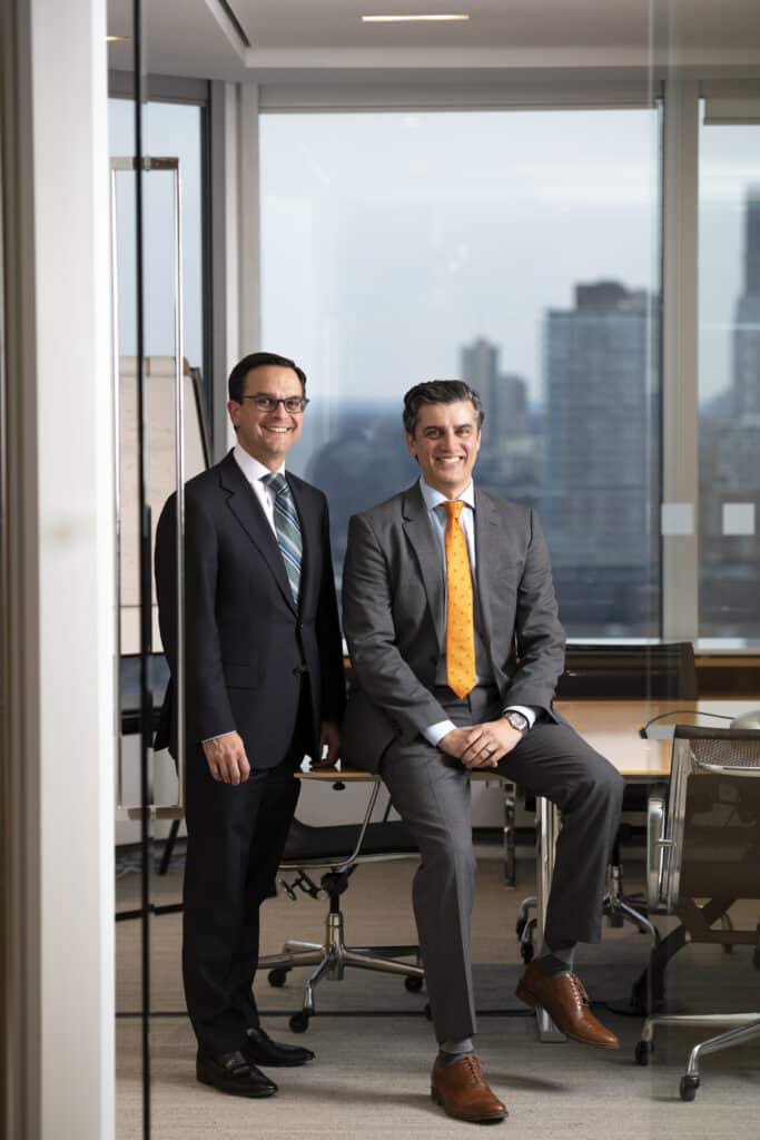 Two business people in a conference room