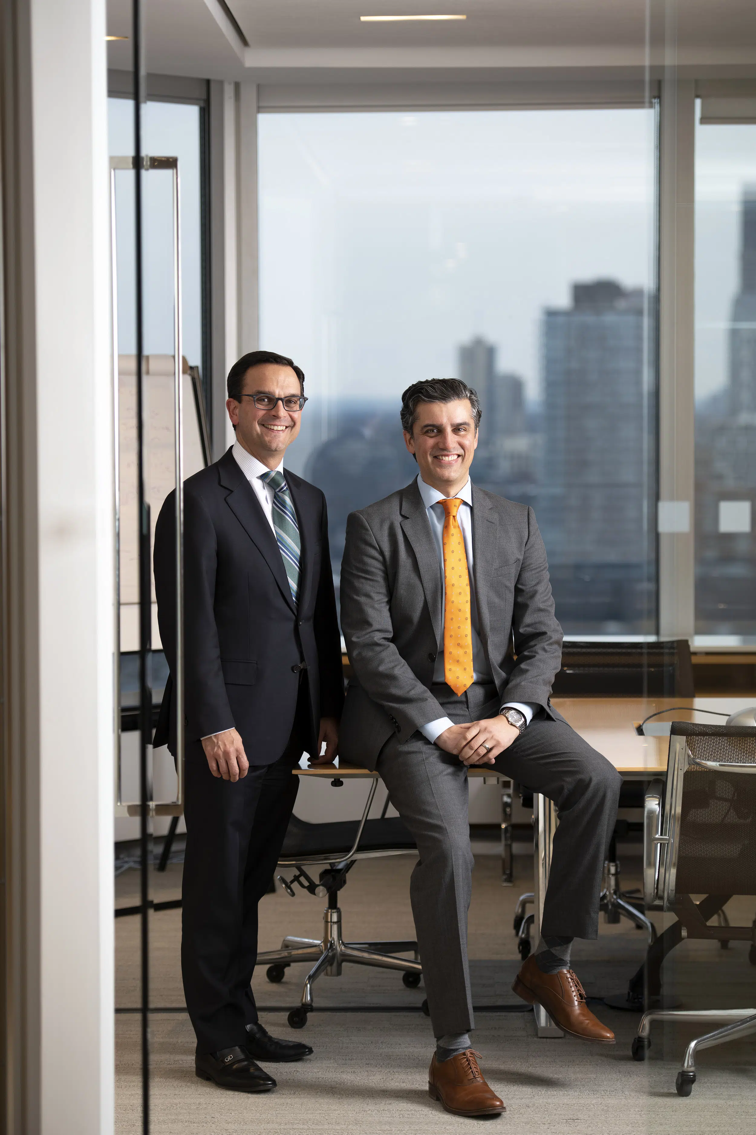 Two business people in a conference room