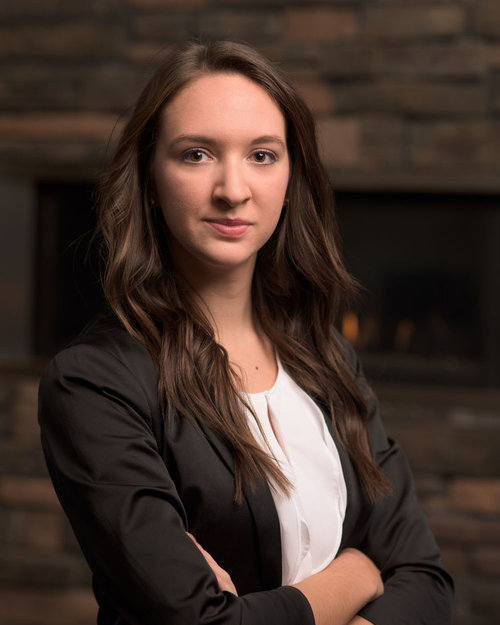 Female realtor with natural office background