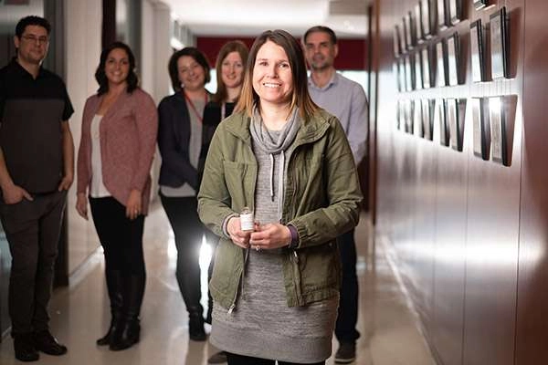 Photographing A Large Medical Research Facility - Dsc 7539Copy A medical researcher holds a new product