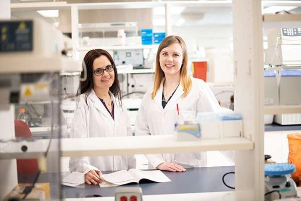 Photographing A Large Medical Research Facility - Dsc 7752Copy Two lab technicians pose for a casual photograph