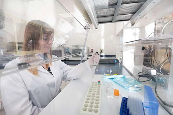 Photographing A Large Medical Research Facility - Dsc 7806Copy A lab technician measuring different solutions