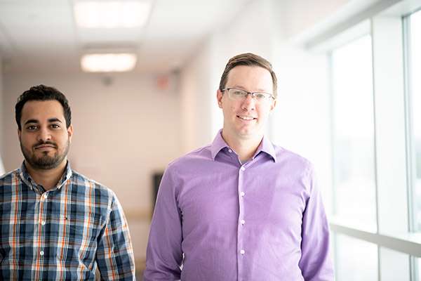 Photographing A Large Medical Research Facility - Dsc 8080Copy Two researchers walk down the hallway