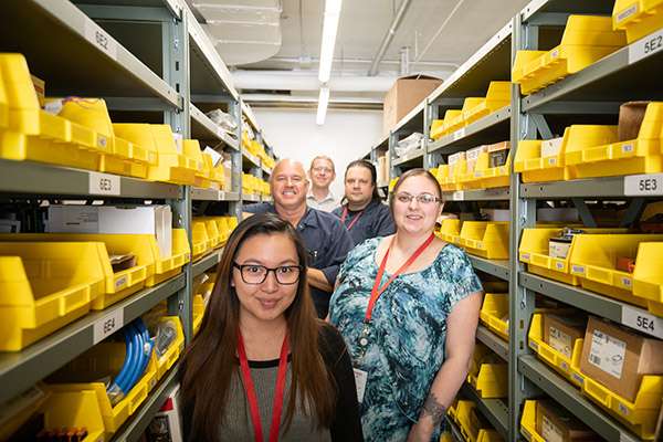 Photographing A Large Medical Research Facility - Dsc 8352Copy Workers inside a supply area.