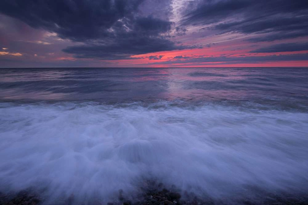 Sunset on the atlantic ocean, off the cabot trail. © robert lowdon