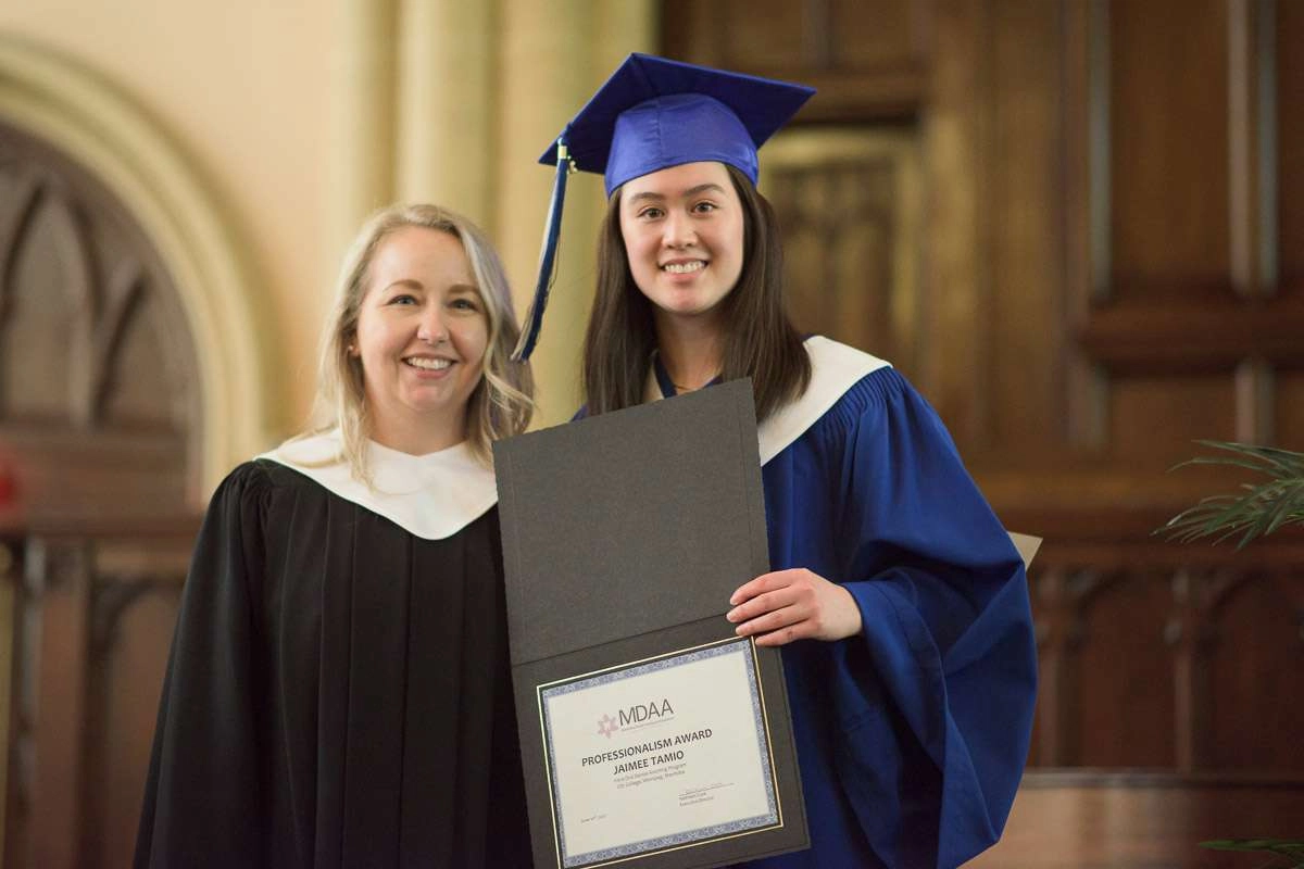 Editorial Photography For Cdi College - Editorial Photgrapher Robert Lowdon Cdi 11 An instructor poses with a student holding an award certificate.