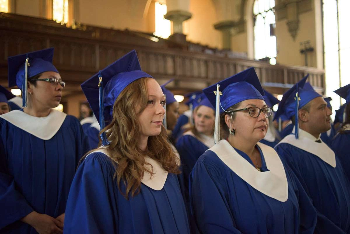 Editorial Photography For Cdi College - Editorial Photgrapher Robert Lowdon Cdi 5 This photograph captures rows of students from a side angle as they look towards the front of the auditorium.