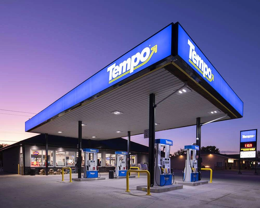 Just after sunset the sky glows purple over the gas station. © Robert Lowdon marketing photo of gas station