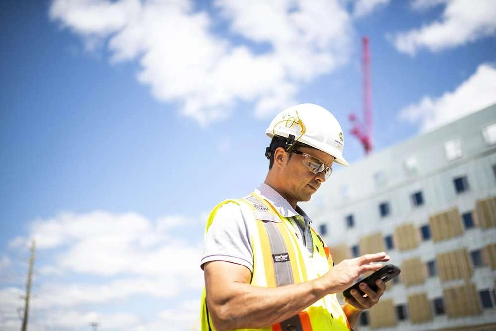 Construction worker with tablet