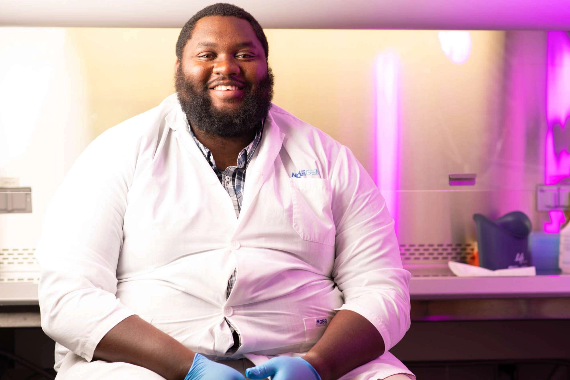 laboratory photography of employee with dynamic lighting