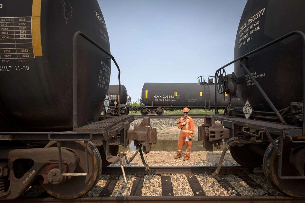 Connecting rail cars at yard