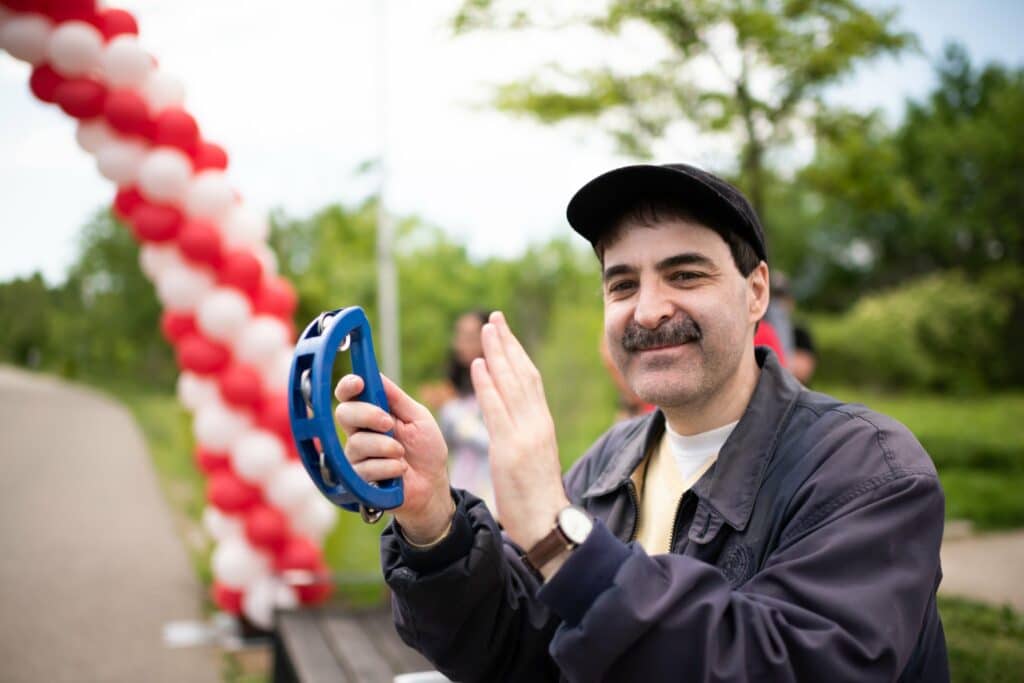What Are The Benefits Of Press Releases For Your Business? We Asked Industry Professionals. - Ms Walk Toronto 2022 Robert Lowdon Photography Dsc 9612 Individual cheering on people crossing the finish line at the ms walk in toronto.