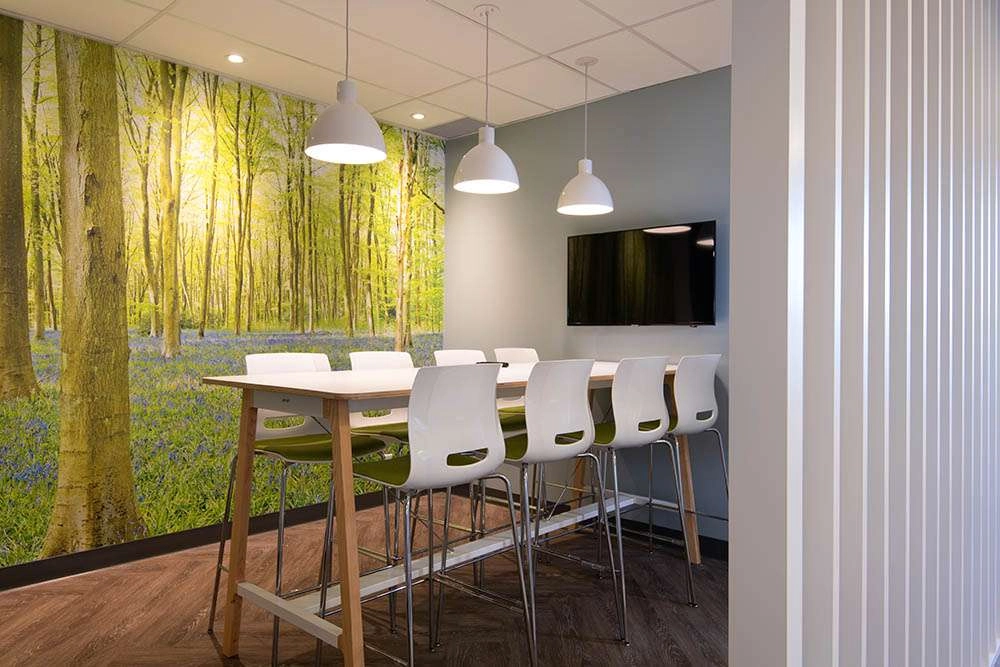 office-interior This sleek, new office is perfect for anyone who wants to get work done in style. With plenty of space to spread out and a modern design, it's easy to stay productive in this environment.