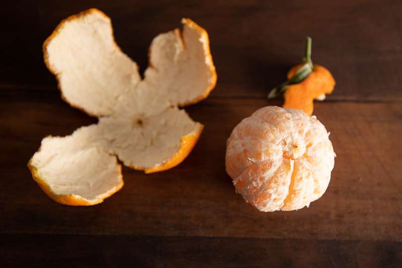 Stock Photography: Story Of An Orange - Orange 4 Orange with peel removed