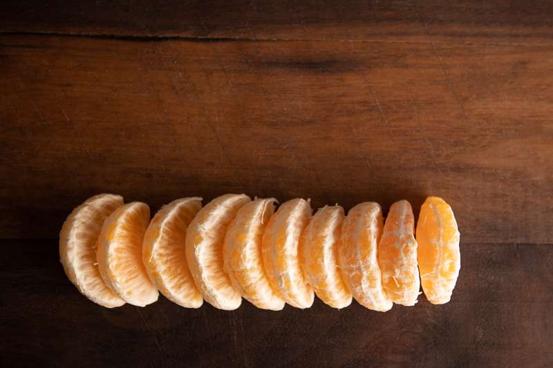 Stock Photography: Story Of An Orange - Orange 7 Segments with copy space