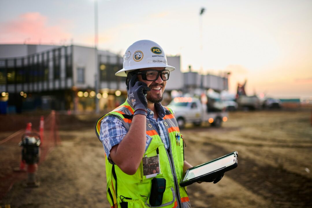 Website image of construction worker at airport facility